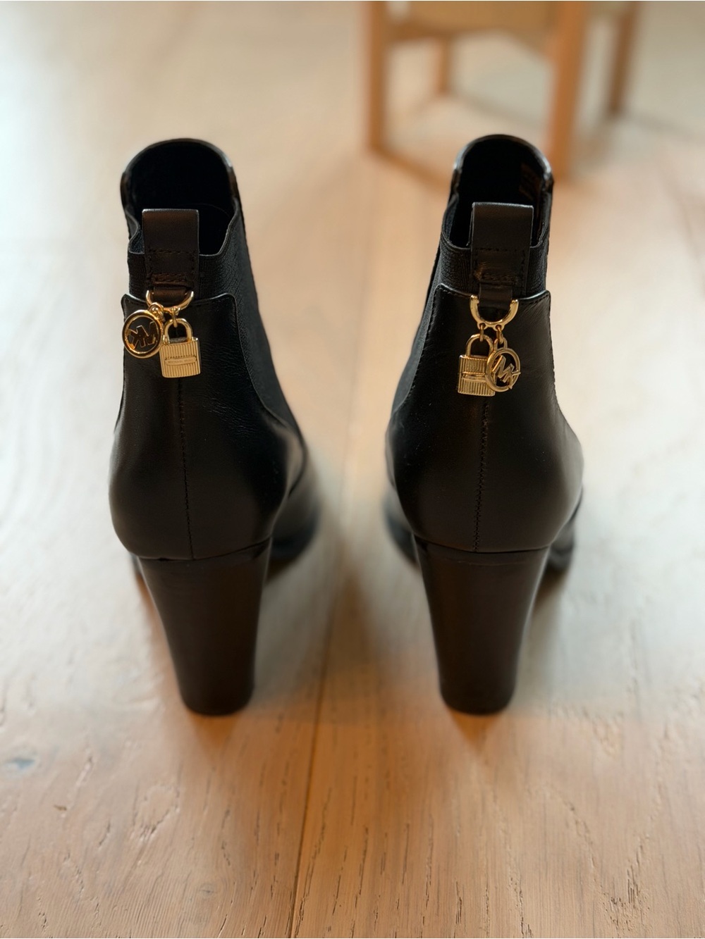 Michael Kors Black Leather Block Heel Ankle Booties with Gold Charm